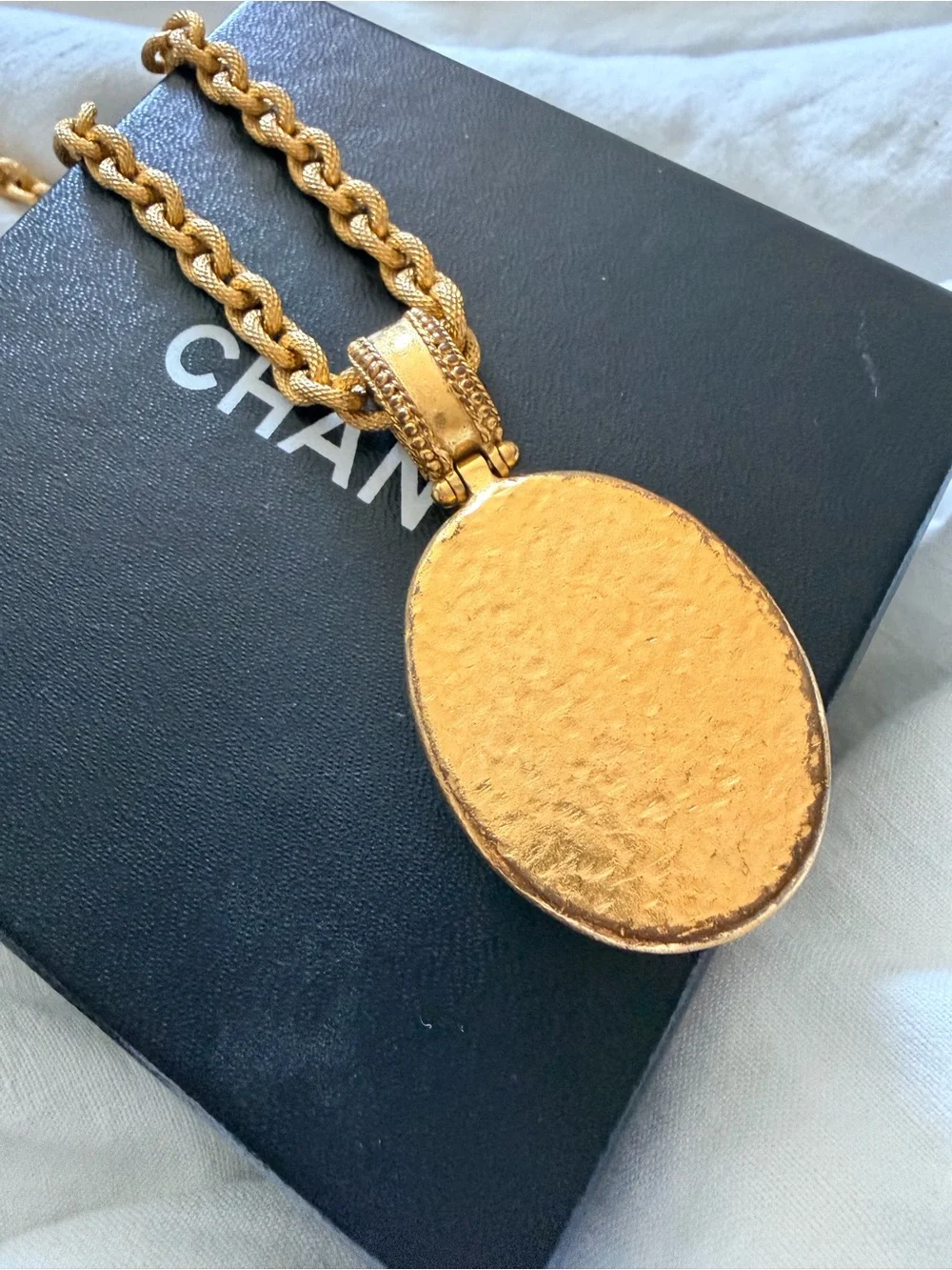 CHANEL Gold and White Oval CC Pendant Necklace
